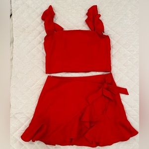 Red 2 piece boutique set. Skirt and crop top. Brand TCEC. Size Large